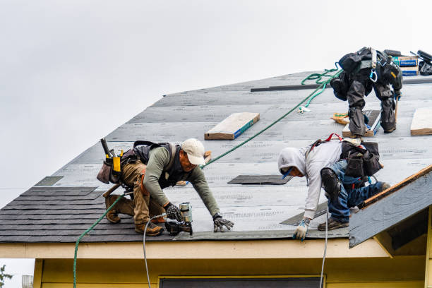 Professional Gutter Installation technician working in Spangle, WA